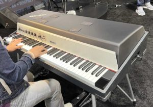 The new Rhoades piano at NAMM 2022